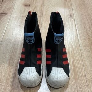 Adidas rain boots where fashion meets versatility.